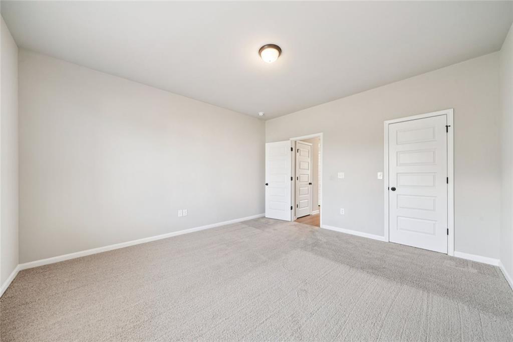 1547 Stinson Lane Locust Grove, GA 30248 - Photo 17 of 43 a view of empty room
