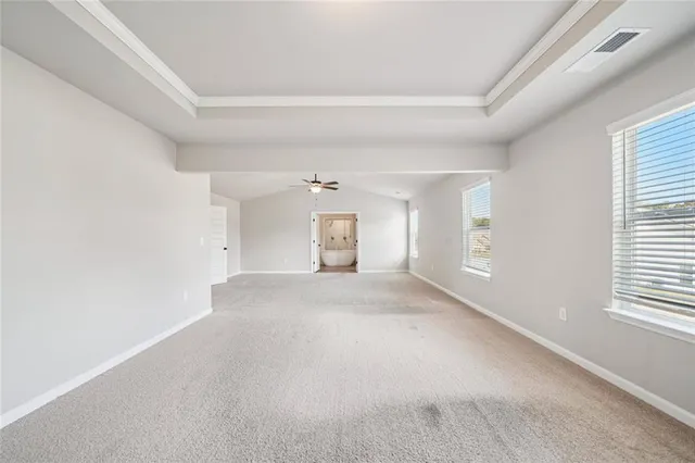 a view of a livingroom and a window