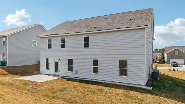 a view of a backyard of a house