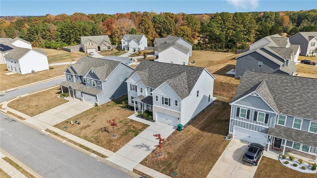 1547 Stinson Lane Locust Grove, GA 30248 - Photo 39 of 43 an aerial view of a house with a yard