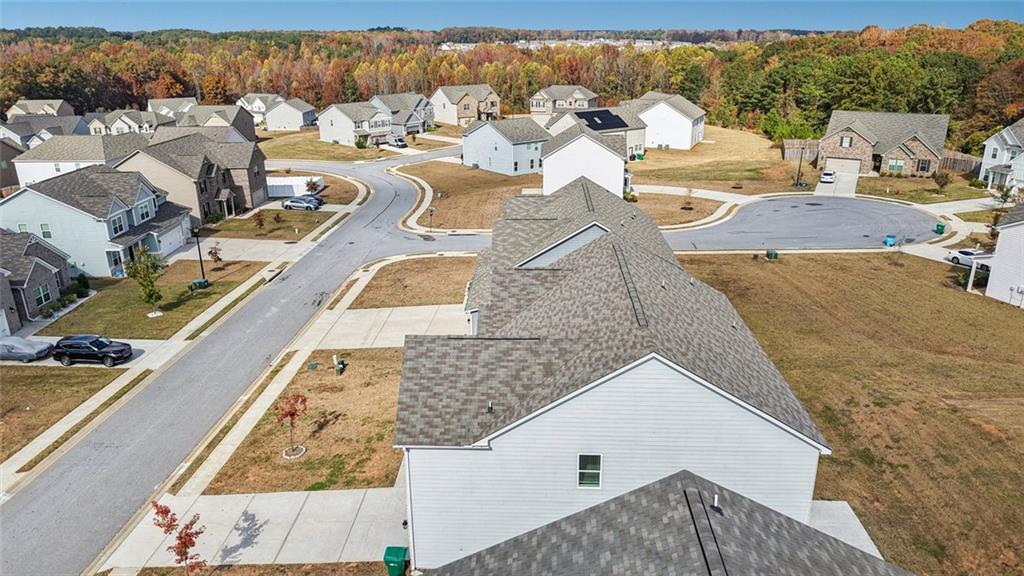 1547 Stinson Lane Locust Grove, GA 30248 - Photo 40 of 43 an aerial view of a house with a yard