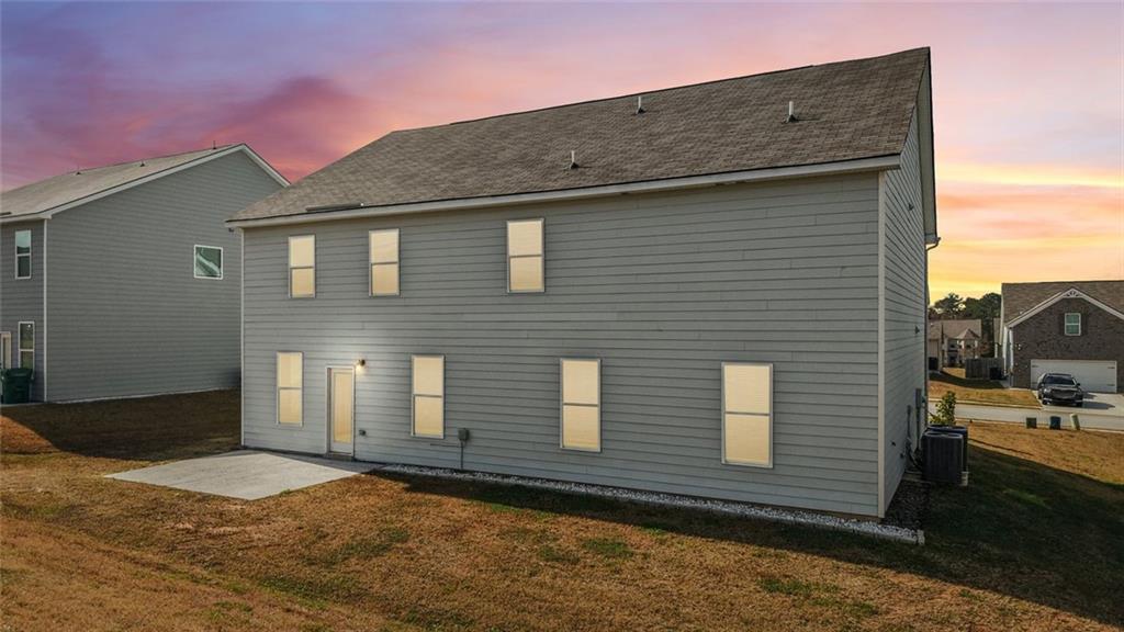 1547 Stinson Lane Locust Grove, GA 30248 - Photo 43 of 43 a front view of a house with parking space