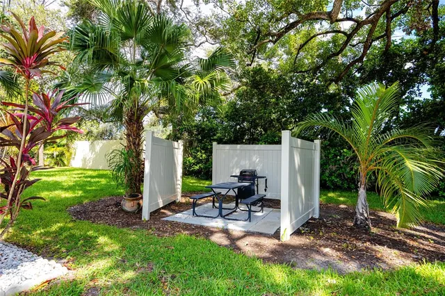 a view of a backyard with a patio
