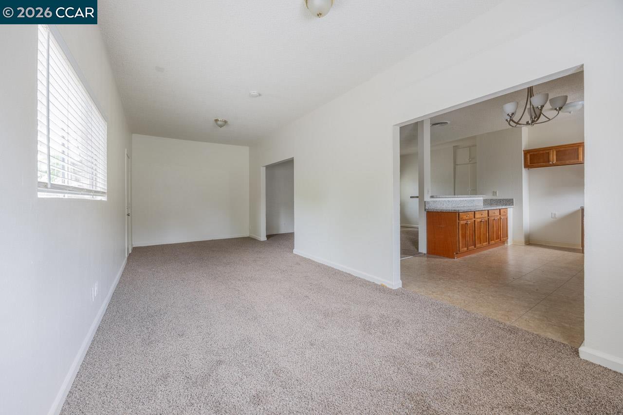 6118 Rutland Drive Carmichael, CA 95608 - Photo 3 of 19 a view of an empty room with a window
