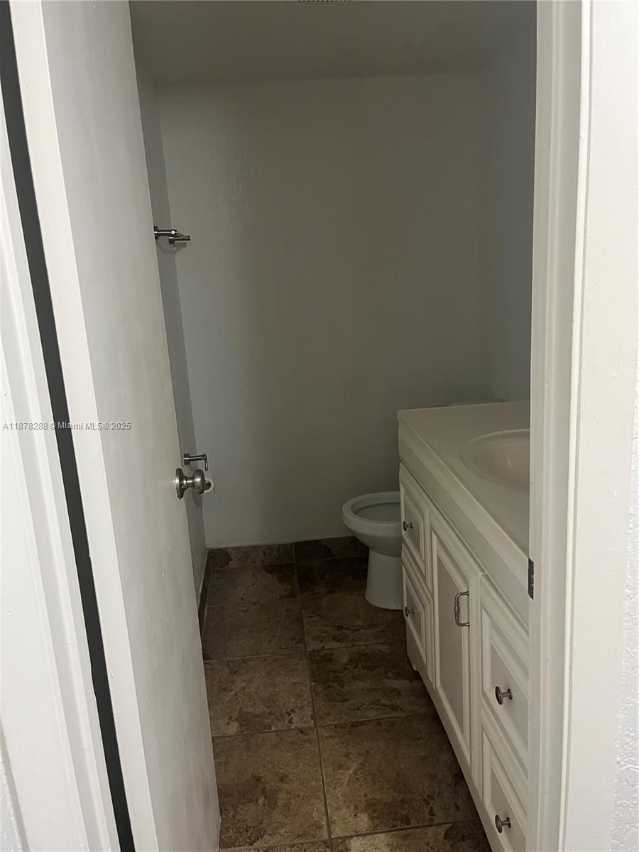 3720 North Pine Island Road, Unit 331 Sunrise, FL 33351 - Photo 15 of 22 a bathroom with a sink and toilet