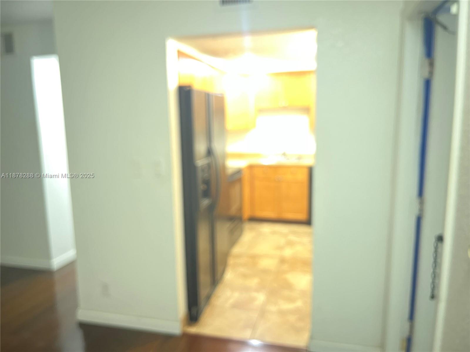 3720 North Pine Island Road, Unit 331 Sunrise, FL 33351 - Photo 7 of 22 a view of an empty room and window