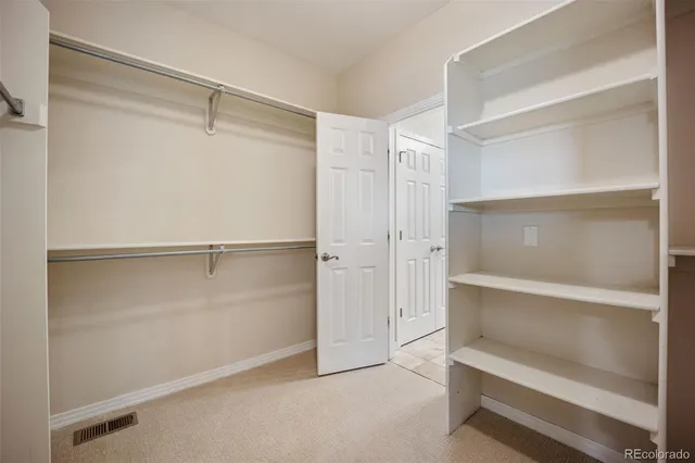a view of an empty walk in closet