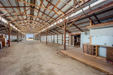 a view of a room with wooden roof