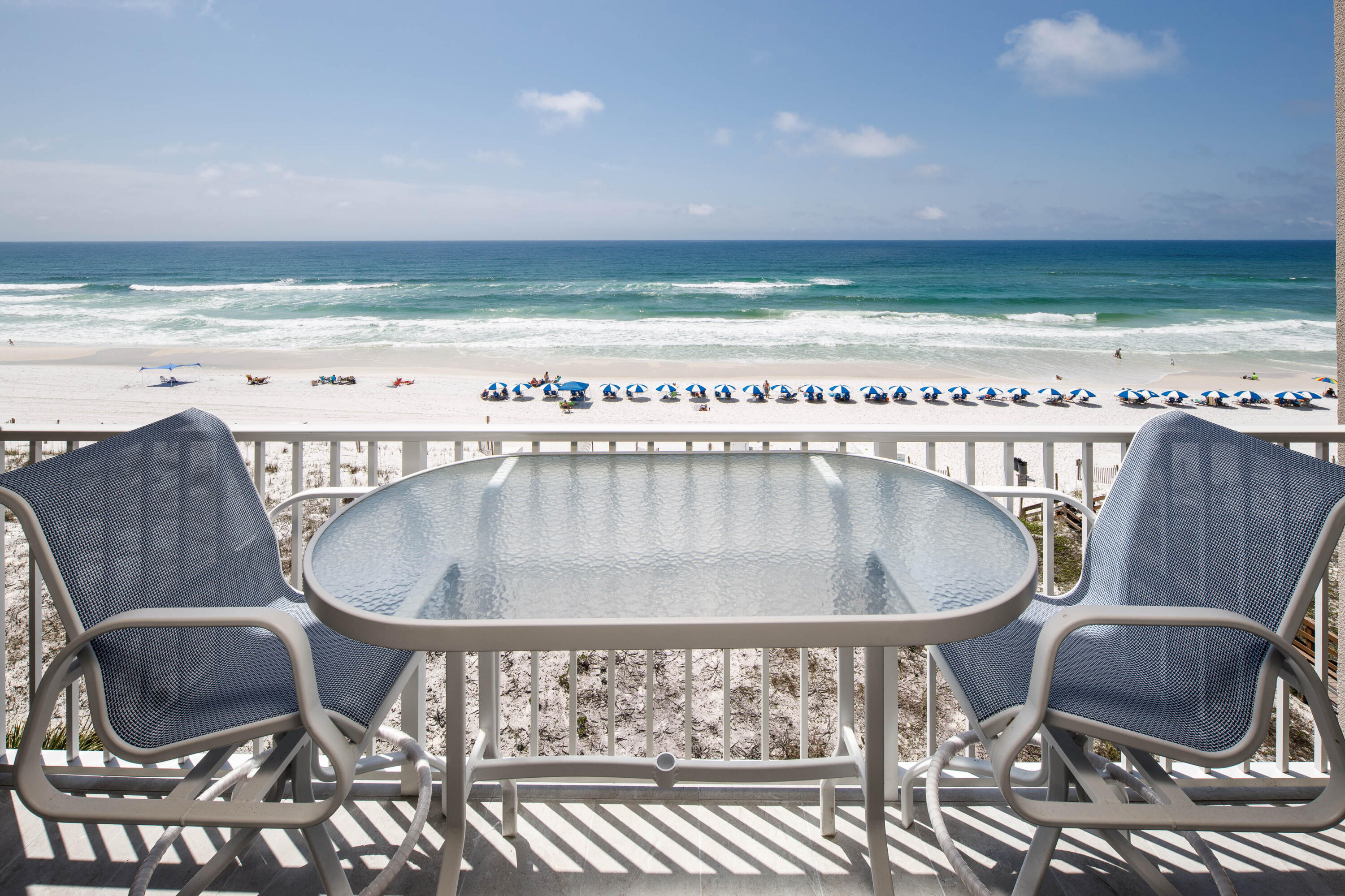 520 Santa Rosa Boulevard, Unit 605 Fort Walton Beach, FL 32548 - Photo 13 of 32 a table with chairs and a dining table with wooden floor