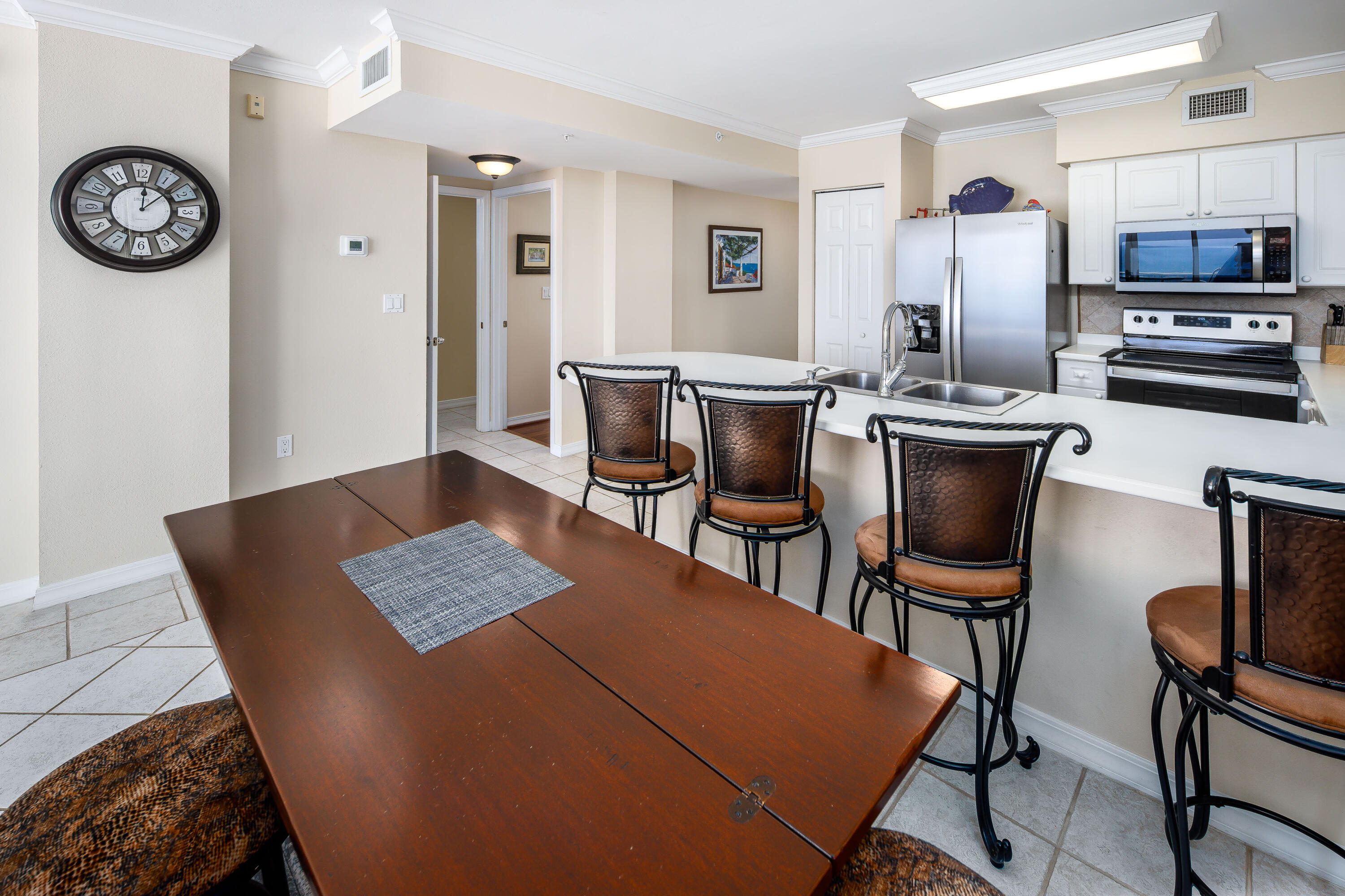 520 Santa Rosa Boulevard, Unit 605 Fort Walton Beach, FL 32548 - Photo 17 of 32 a view of kitchen with cabinets and wooden floor