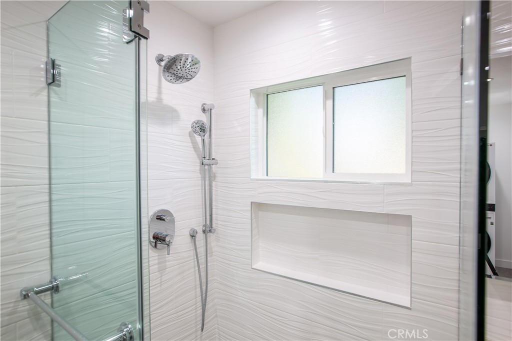 19503 Cantara Street Reseda, CA 91335 - Photo 11 of 19 a bathroom with a shower
