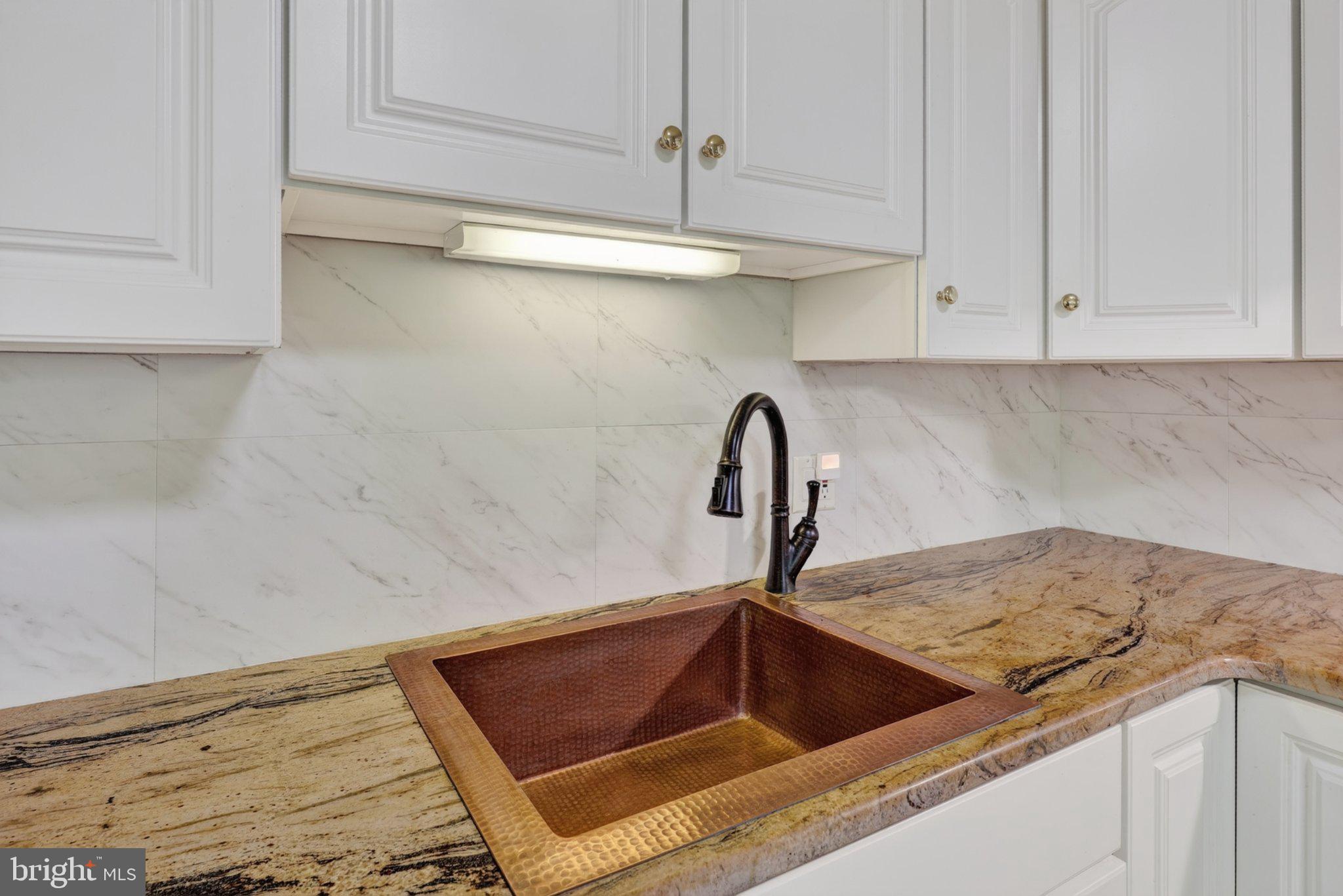 274 The Hill Road, Unit 13A Basye, VA 22810 - Photo 4 of 12 Elegant kitchen with copper sink.