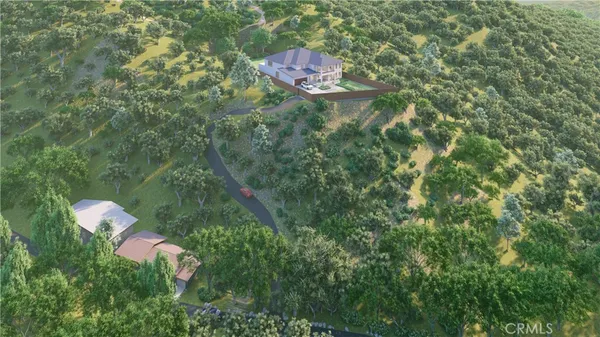 a aerial view of a house with a yard