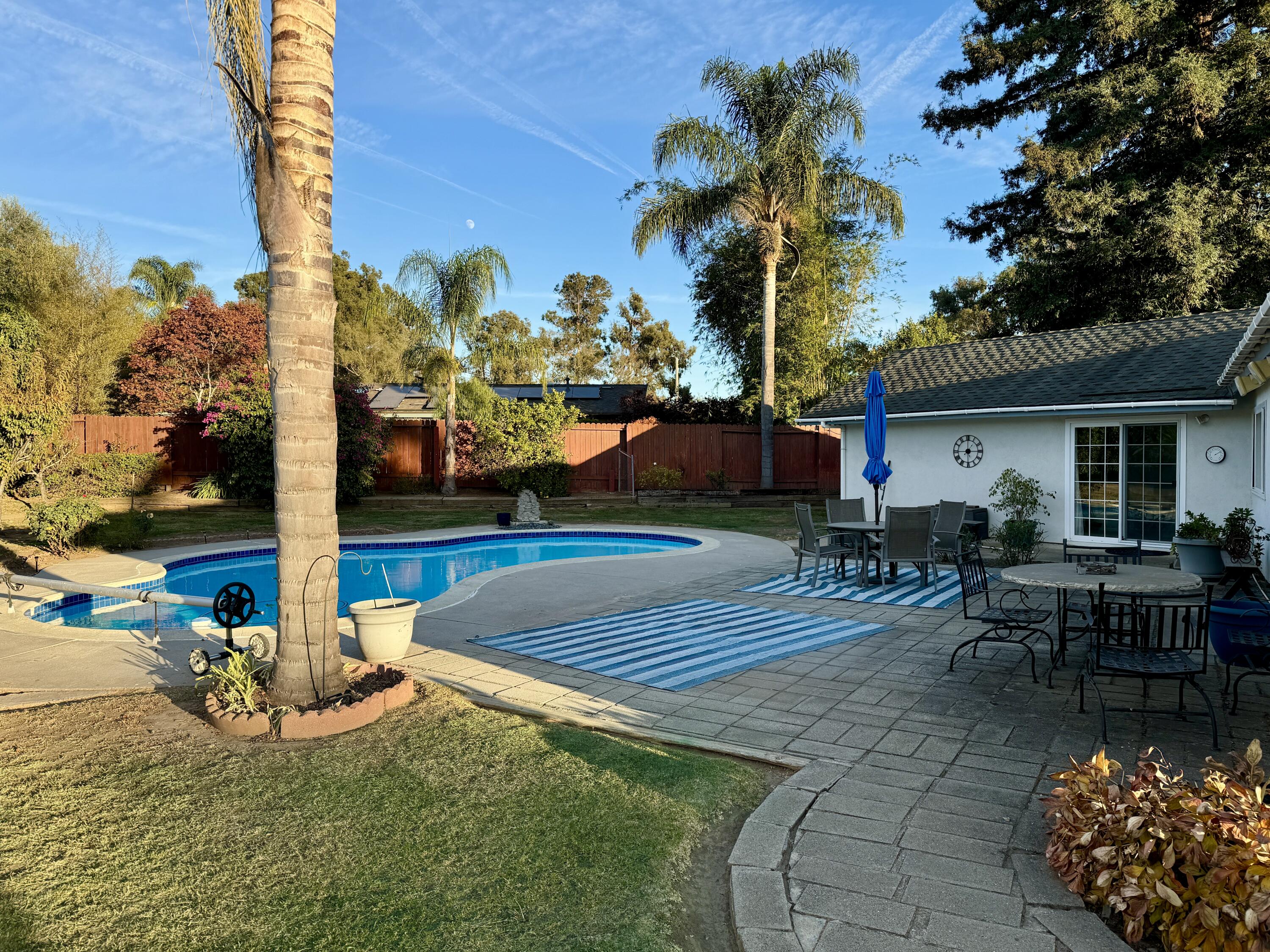 328 Loreto Place Santa Barbara, CA 93111 - Photo 2 of 2 a front view of a house with garden and patio