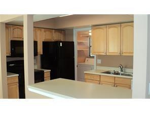 7200 Northwest 2nd Avenue, Unit 146 Boca Raton, FL 33487 - Photo 2 of 12 Kitchen view from dining room