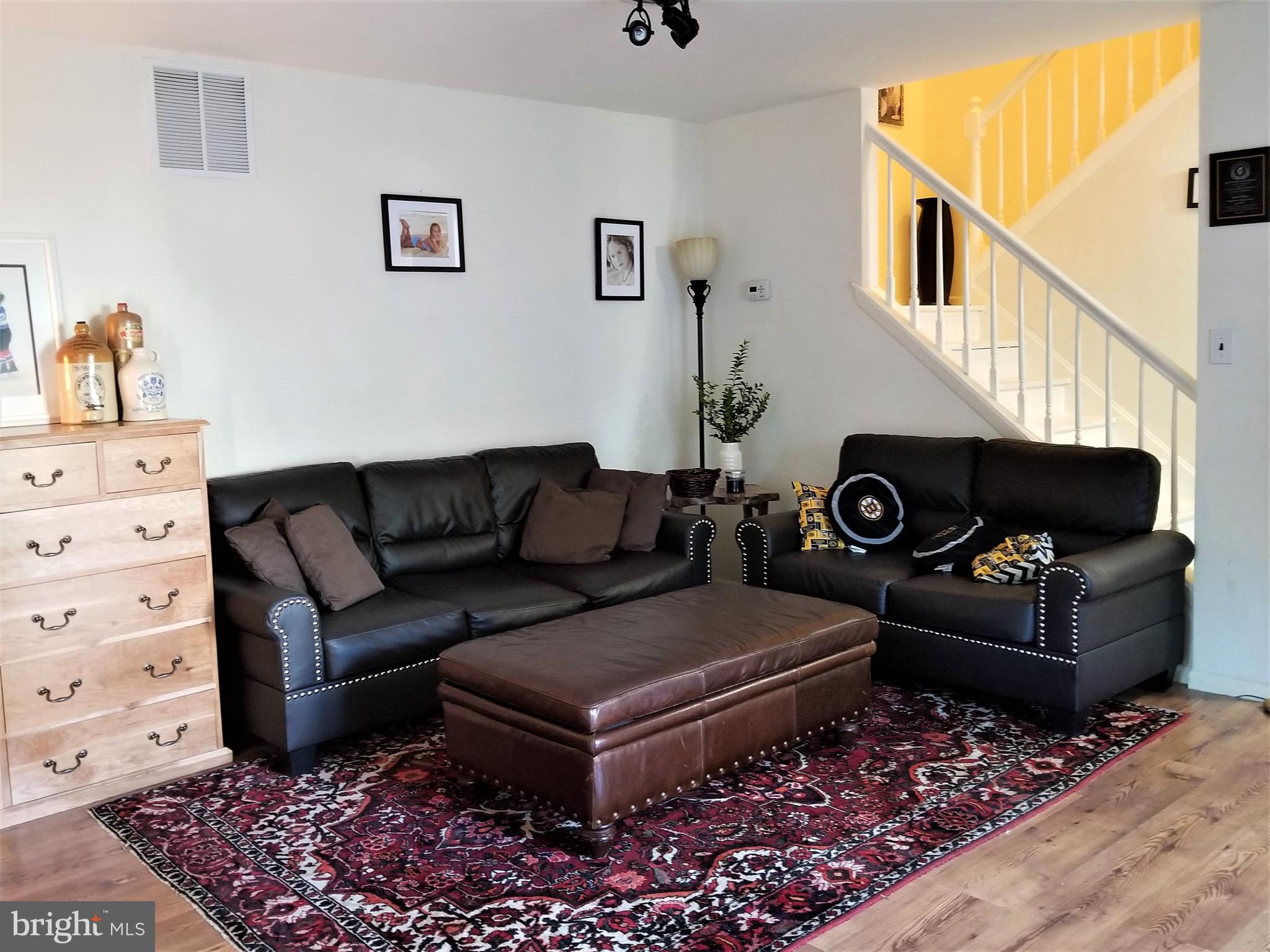 88 Pebble Road East Windsor, NJ 08520 - Photo 3 of 20 Bright living room with laminate flooring