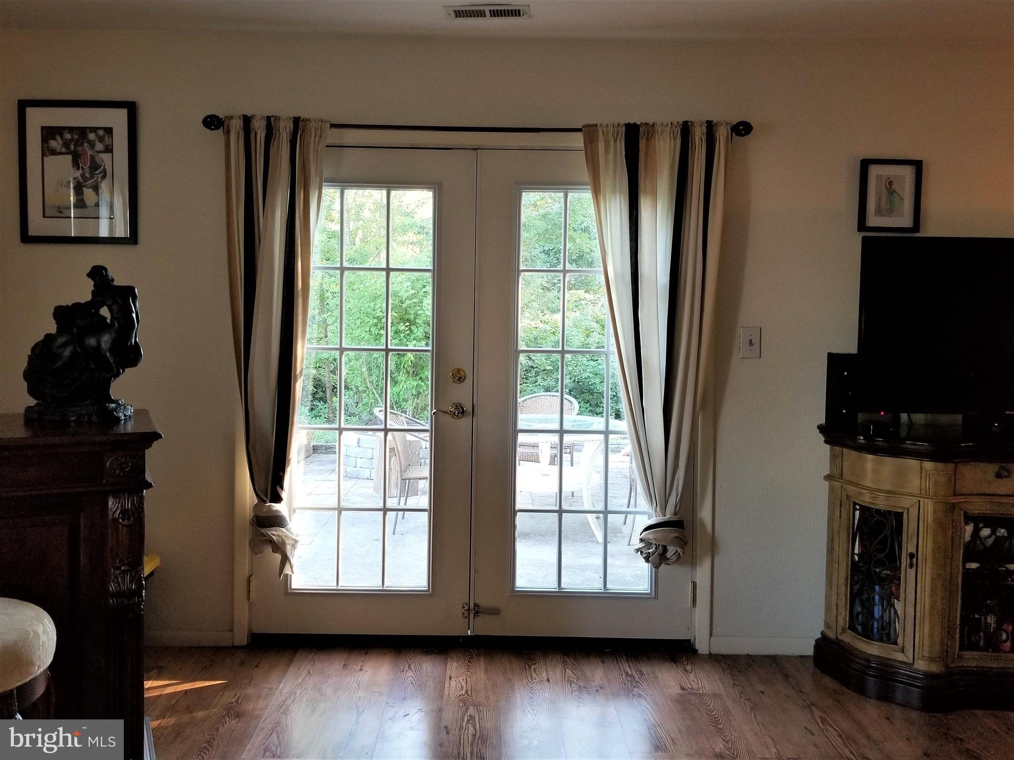 88 Pebble Road East Windsor, NJ 08520 - Photo 4 of 20 French doors from living room to backyard