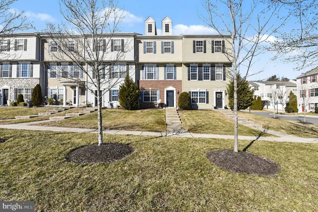 a street view with tall buildings