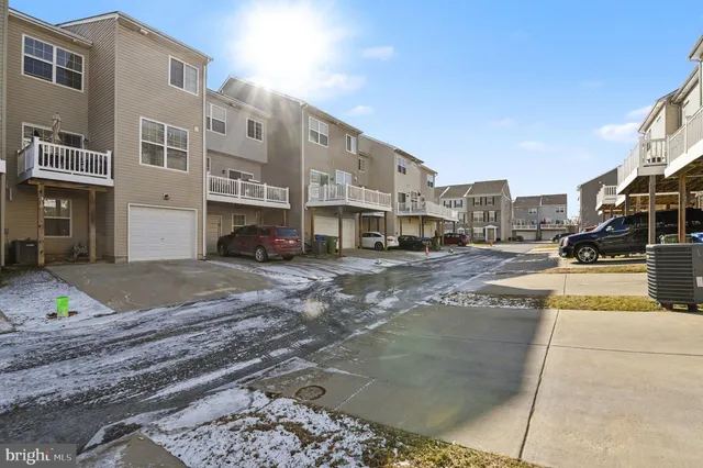 a view of a street with buildings