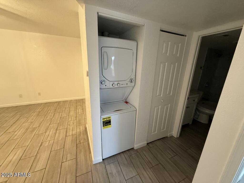234 East Ruth Avenue, Unit 3 Phoenix, AZ 85020 - Photo 5 of 6 a view of a room with wooden floor and bathroom