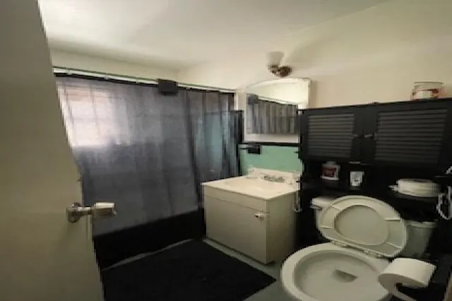 a kitchen with stainless steel appliances granite countertop a refrigerator a sink a stove a microwave a counter space and cabinets