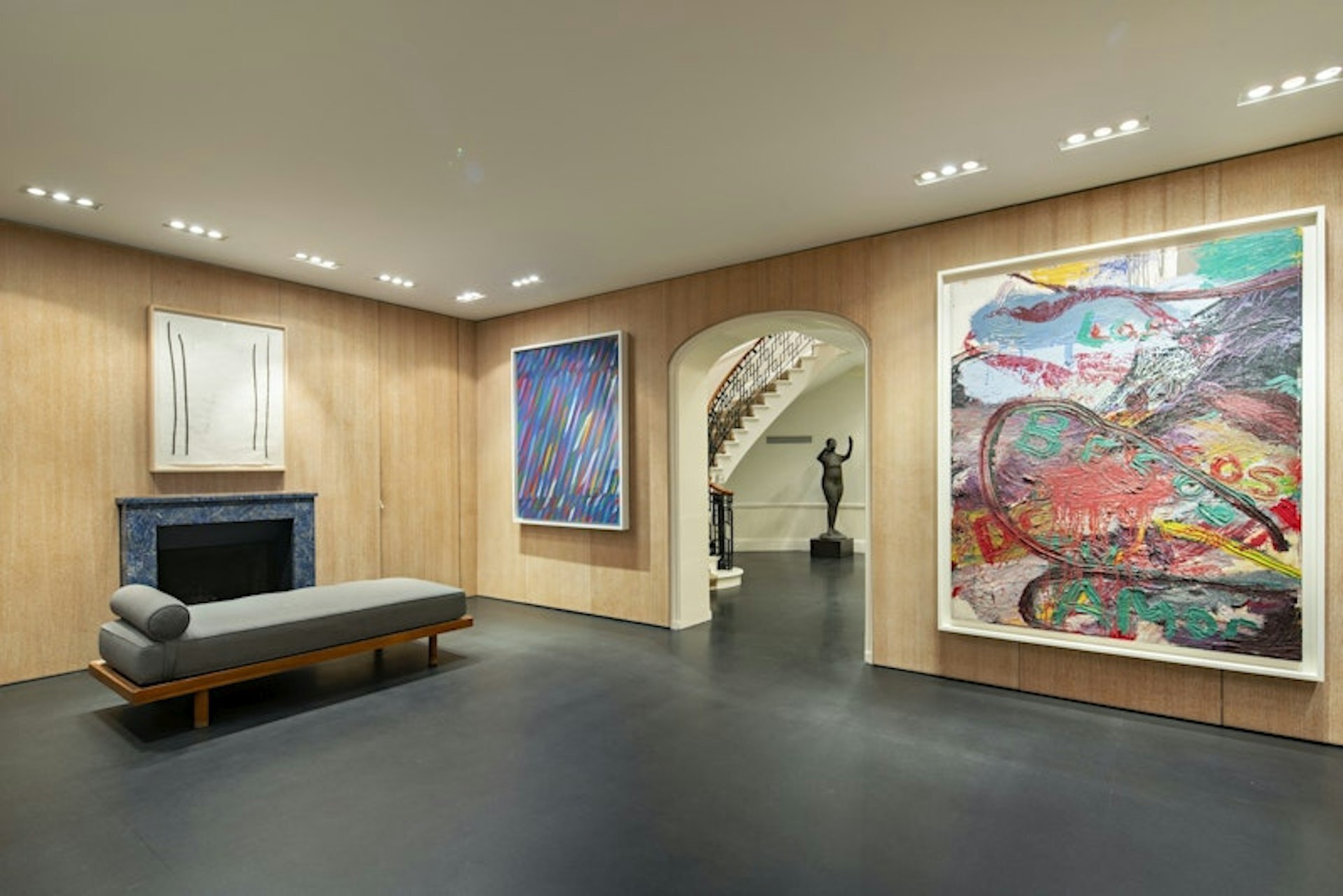 36 East 63rd Street Manhattan, NY 10065 - Photo 2 of 21 a living room with furniture a rug and a wall painting