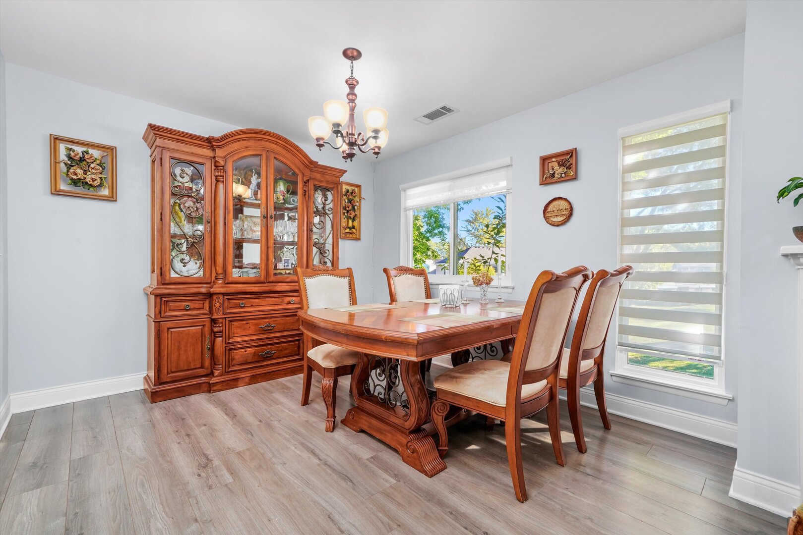 136 Wolcott Court, Unit O2 Schaumburg, IL 60193 - Photo 11 of 31 a view of a dining room with furniture window and wooden floor