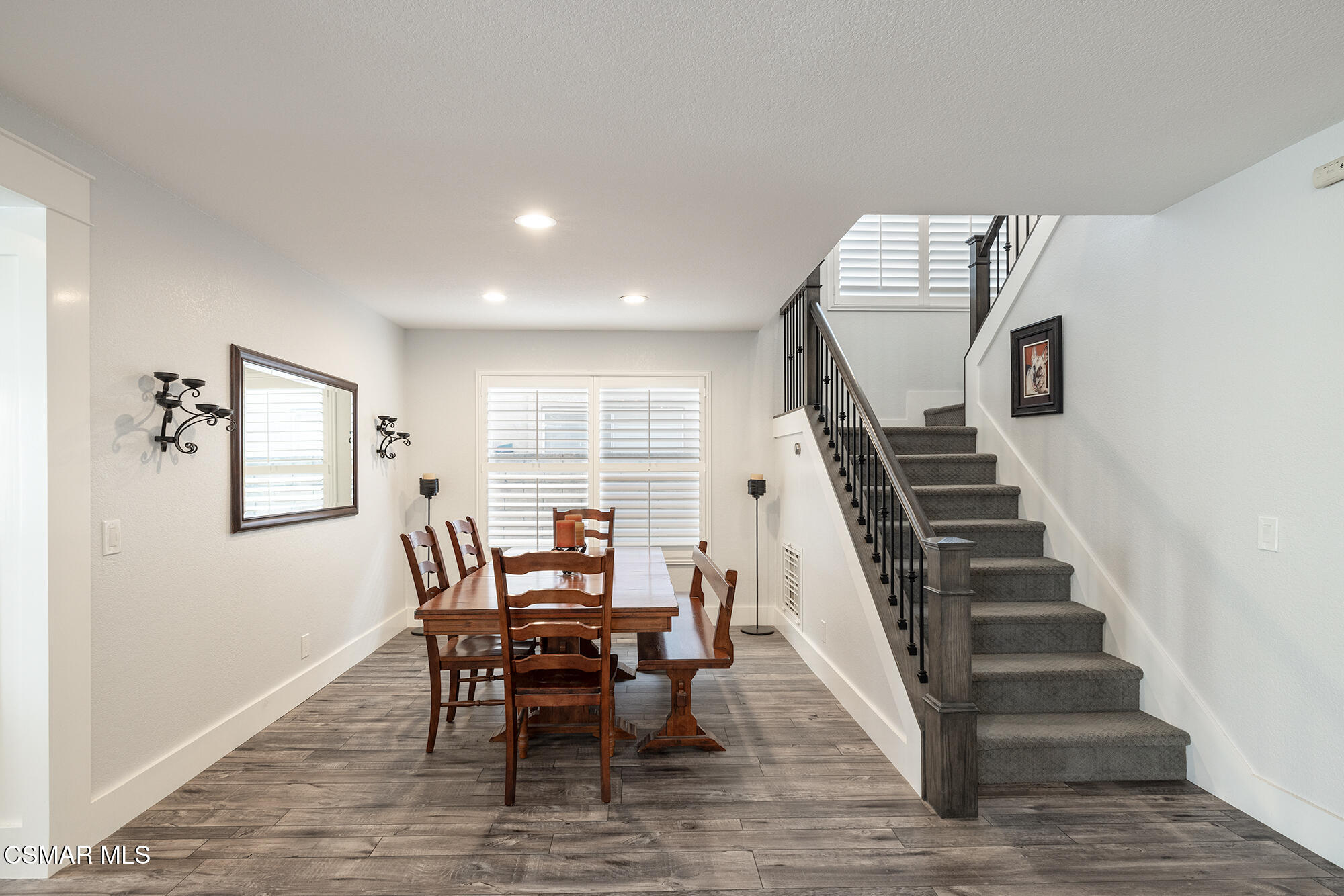 85 Iron Ridge Lane Simi Valley, CA 93065 - Photo 5 of 27 a view of a dining room with furniture and wooden floor