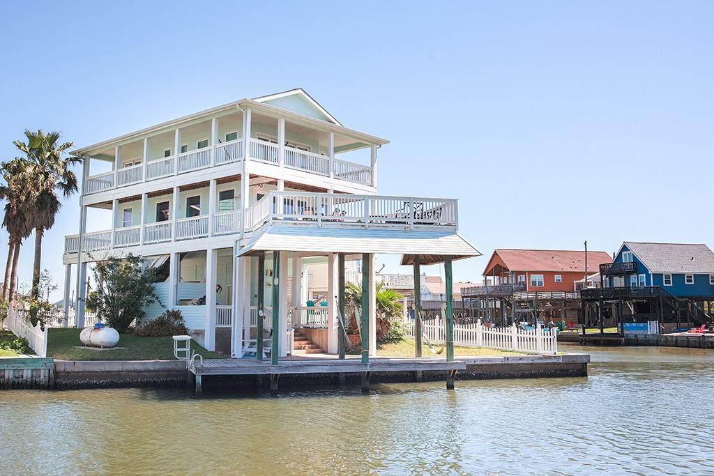 a front view of a building with lake view
