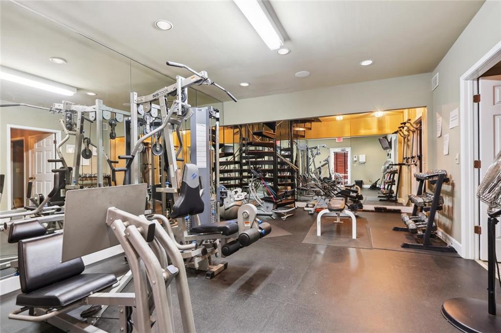 2921 Lenox Road Northeast, Unit 413 Atlanta, GA 30324 - Photo 29 of 36 a view of a room with gym equipment
