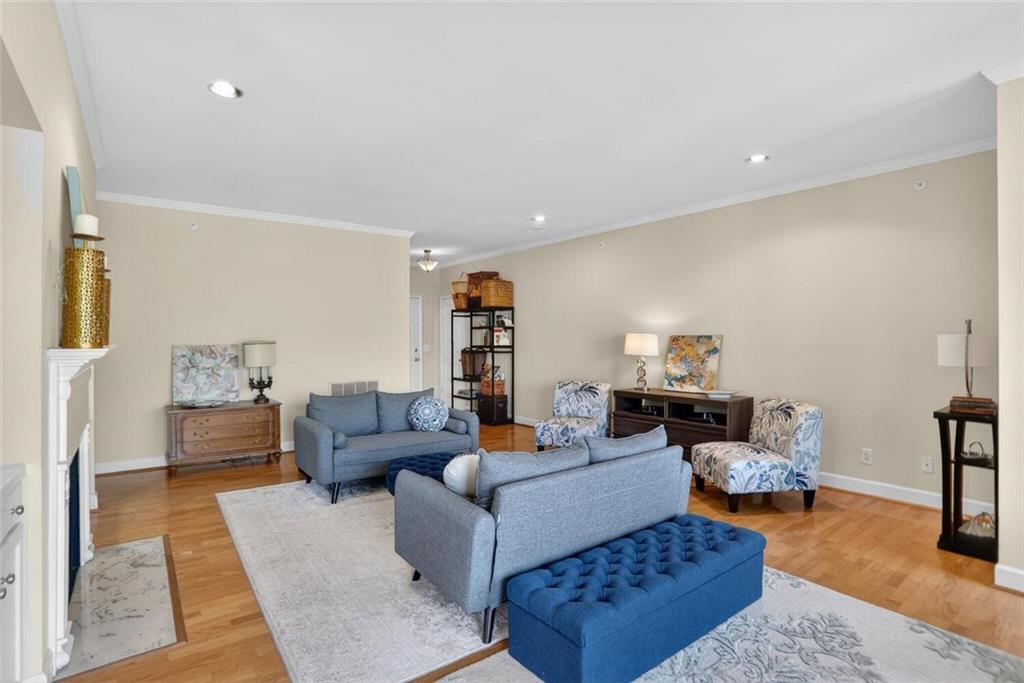 2921 Lenox Road Northeast, Unit 413 Atlanta, GA 30324 - Photo 5 of 36 a living room with furniture and a couch