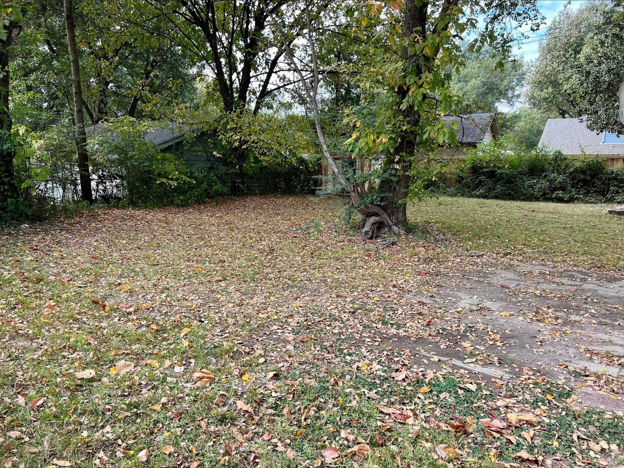 3831 Millbranch Road Memphis, TN 38116 - Photo 12 of 12 a view of backyard with green space
