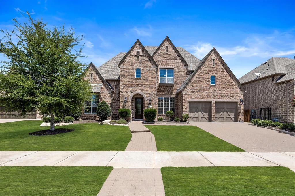1844 Peppervine Road Frisco, TX 75033 - Photo 1 of 1 a front view of a house with a yard