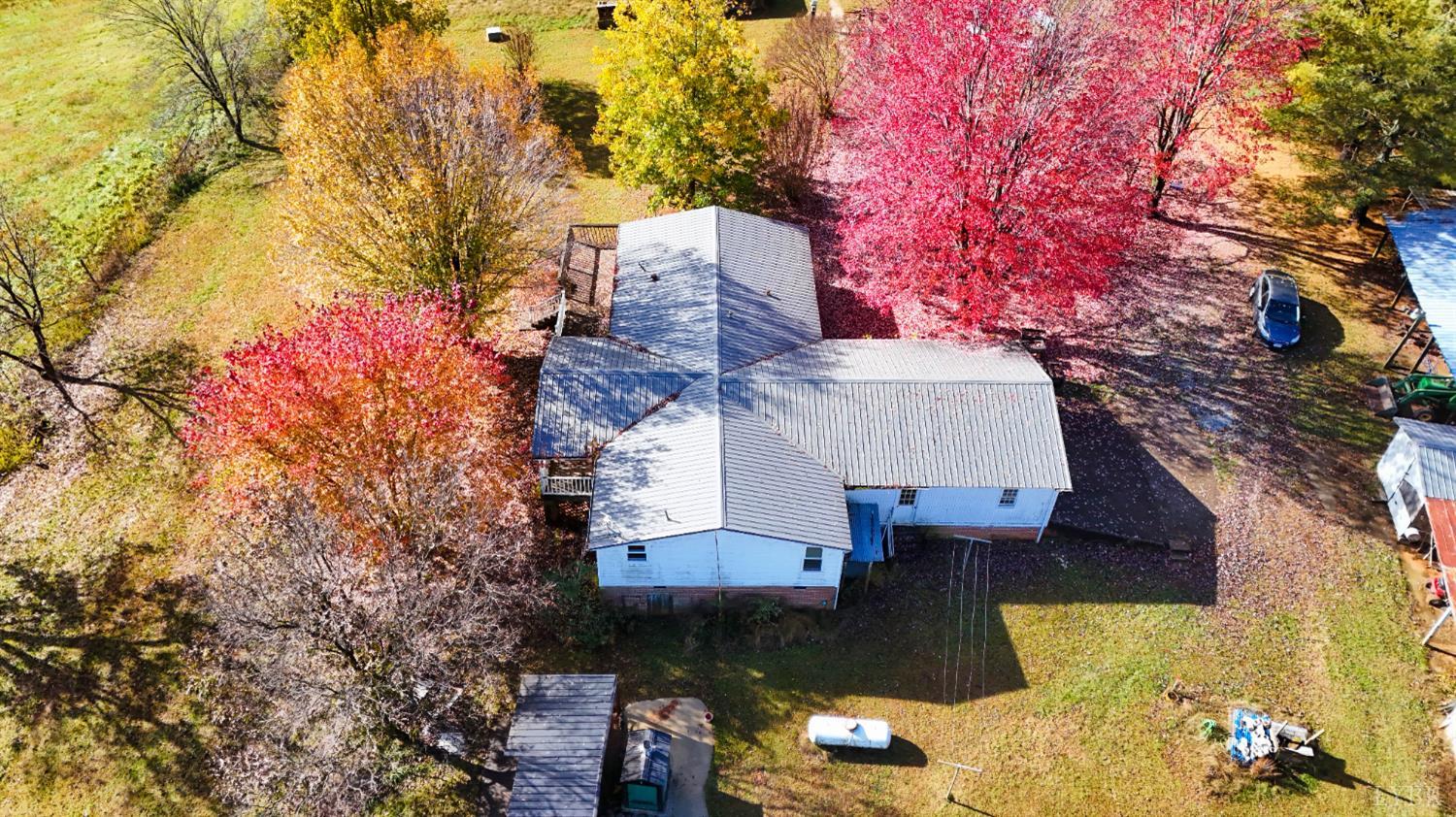 3156 Owens Mill Road Gretna, VA 24557 - Photo 36 of 88 a aerial view of a house with swimming pool and large trees