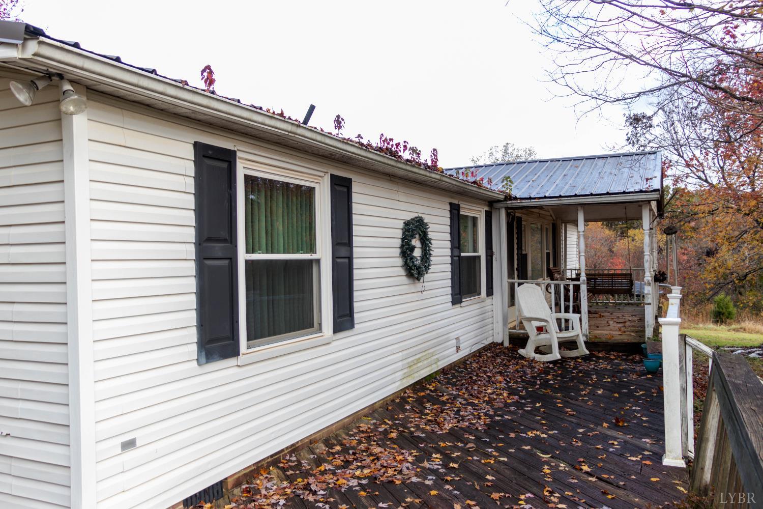 3156 Owens Mill Road Gretna, VA 24557 - Photo 9 of 88 a view of a house with a patio