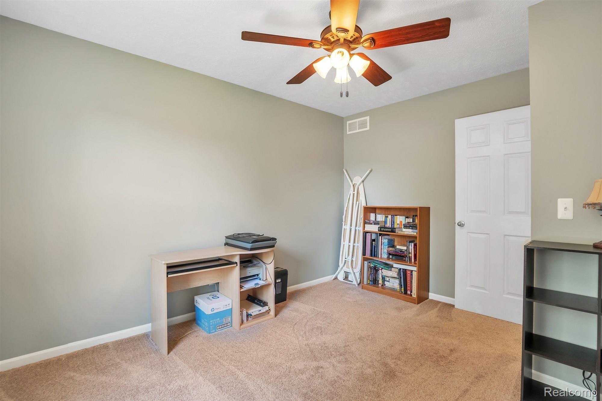182 Turtle Trace Pinckney, MI 48169 - Photo 24 of 37 24-182 Turtle Trace-WindowStill-Rea.jpg