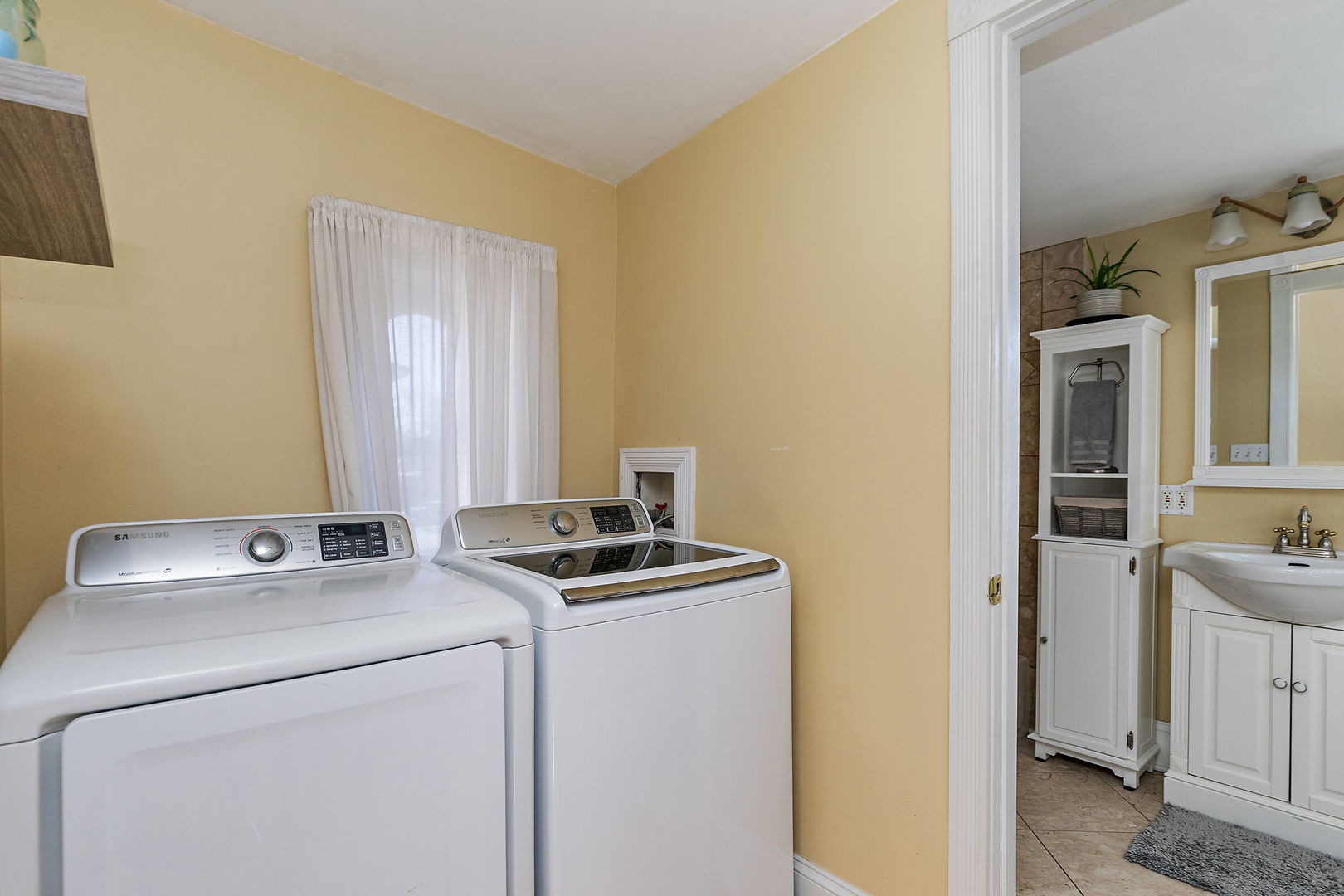 271 Dupage Street Elgin, IL 60120 - Photo 15 of 27 a room with storage and utility