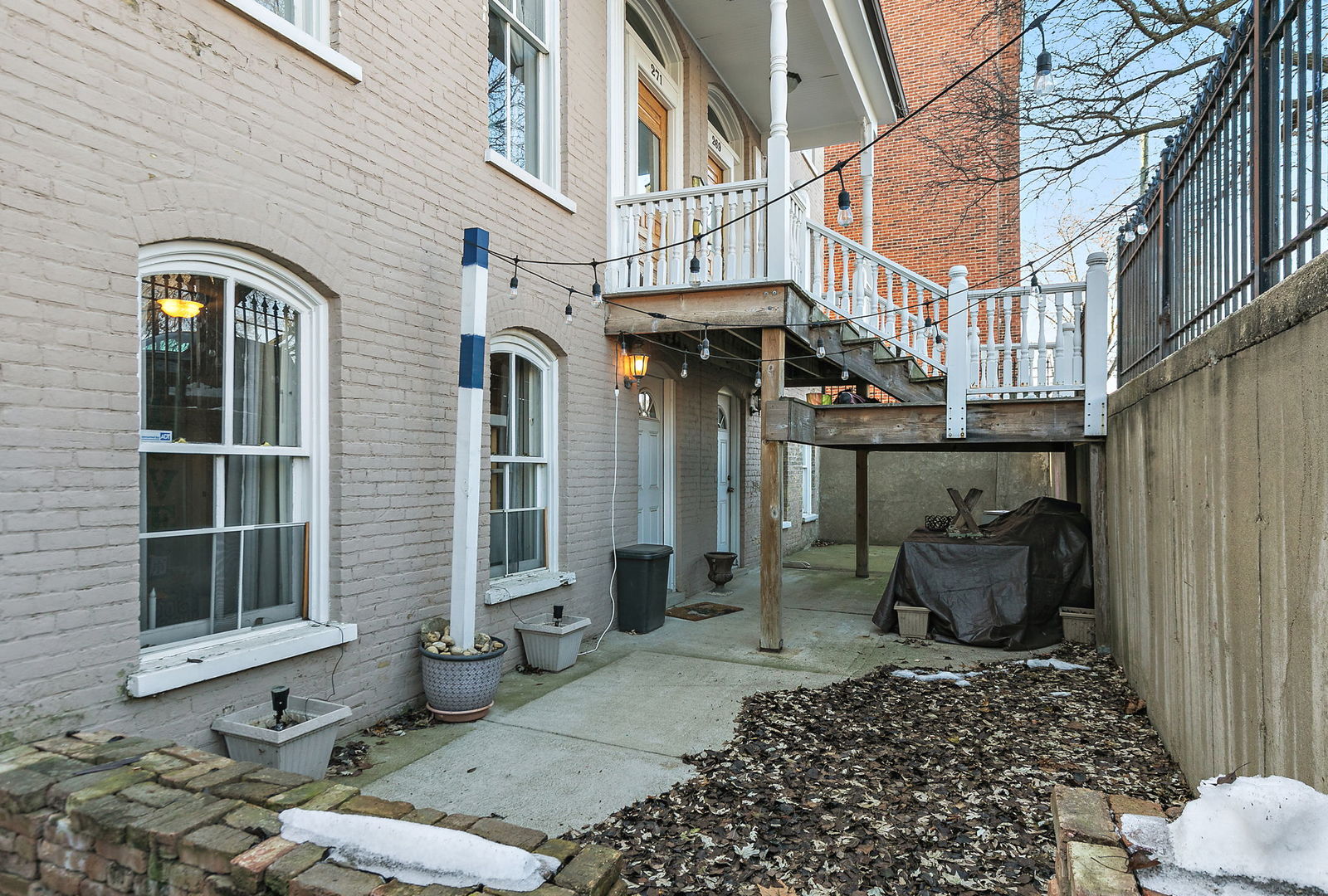 271 Dupage Street Elgin, IL 60120 - Photo 26 of 27 a view of a brick house with many windows