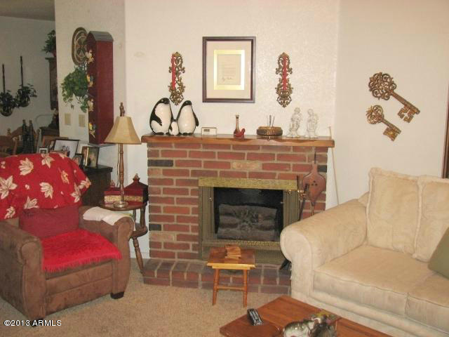 705 North Matterhorn Road Payson, AZ 85541 - Photo 10 of 21 10 Living room portable fireplace with h