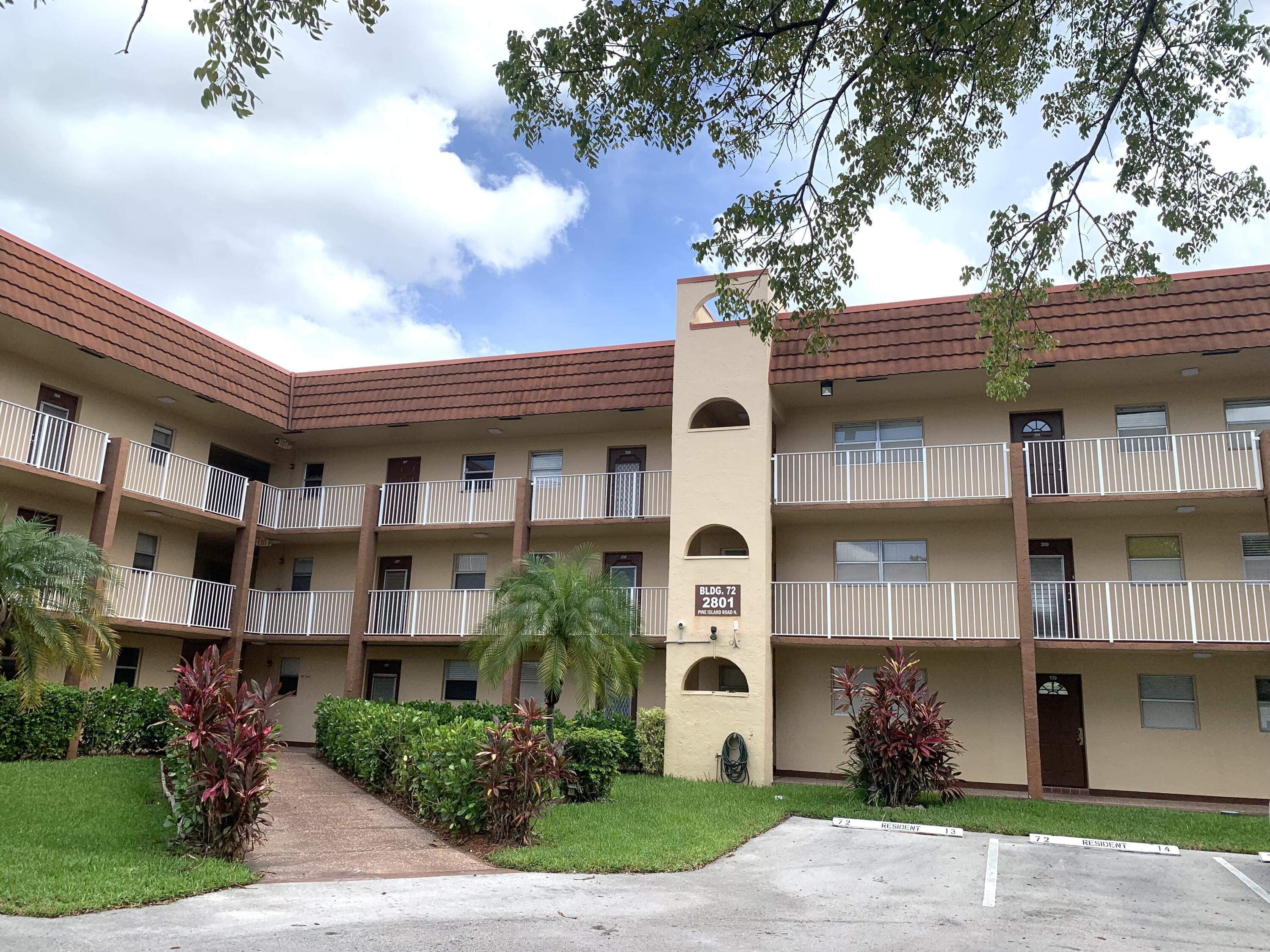 2801 North Pine Island Road, Unit 110 Sunrise, FL 33322 - Photo 21 of 26 IMG_2866 building