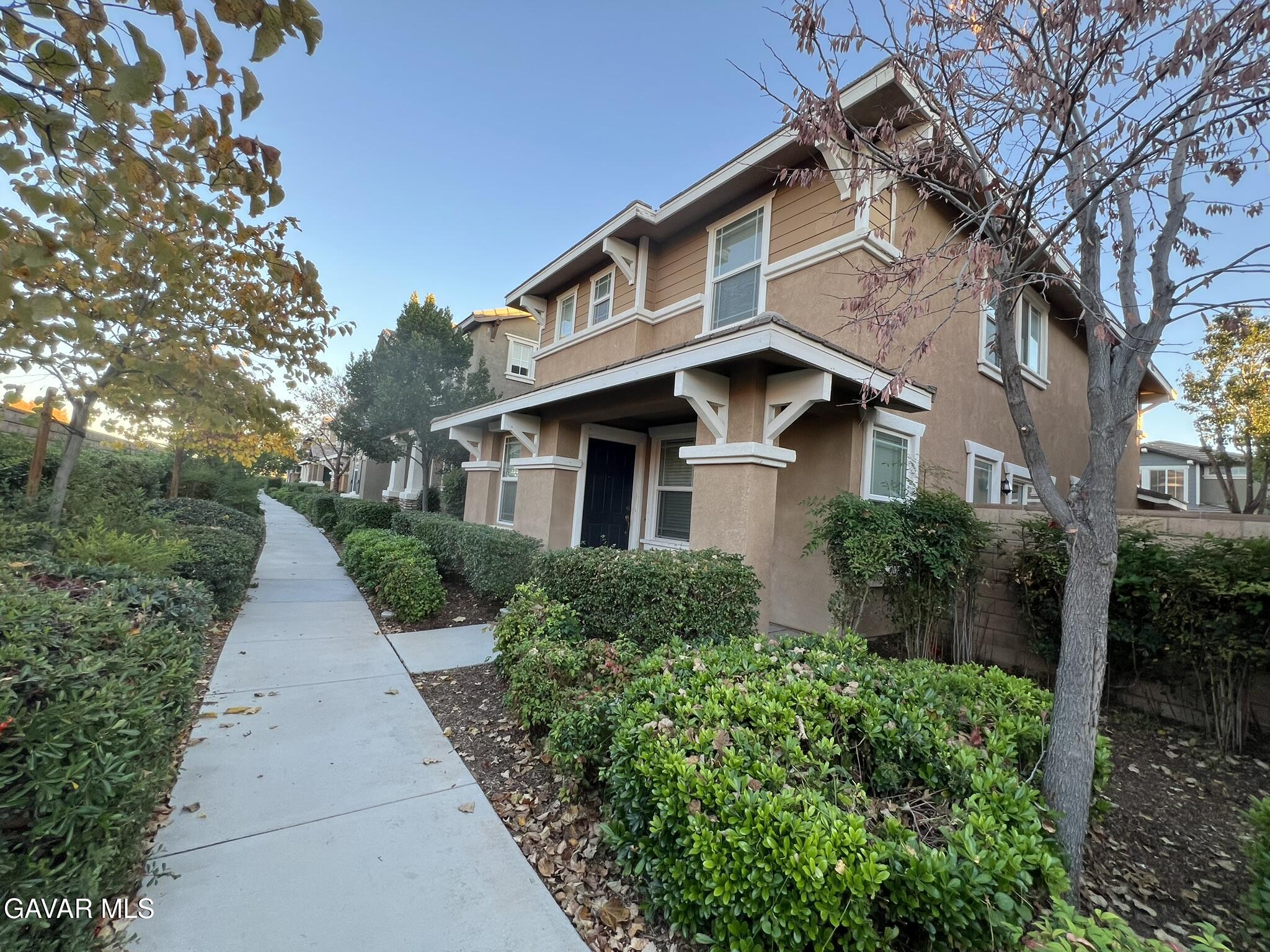 2649 Torres Court Palmdale, CA 93550 - Photo 1 of 33 a front view of a house with yard and green space