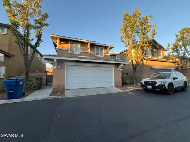 a car parked in front of a house