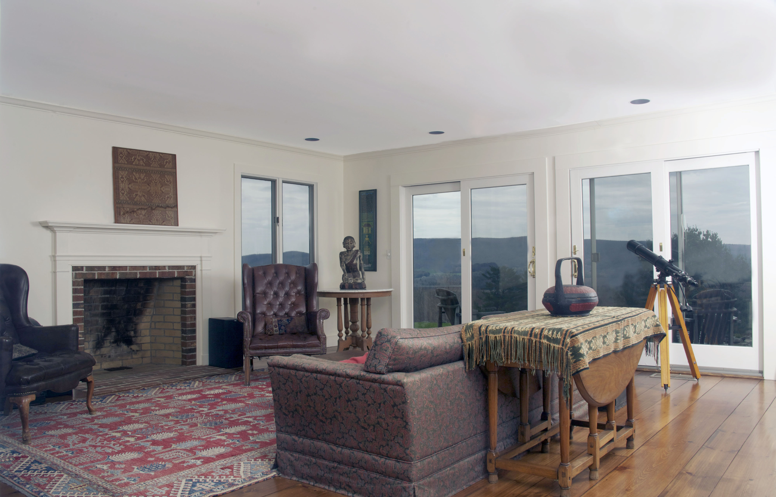 178 Perry Peak Road Richmond, MA 01254 - Photo 11 of 13 a living room with furniture and a fireplace