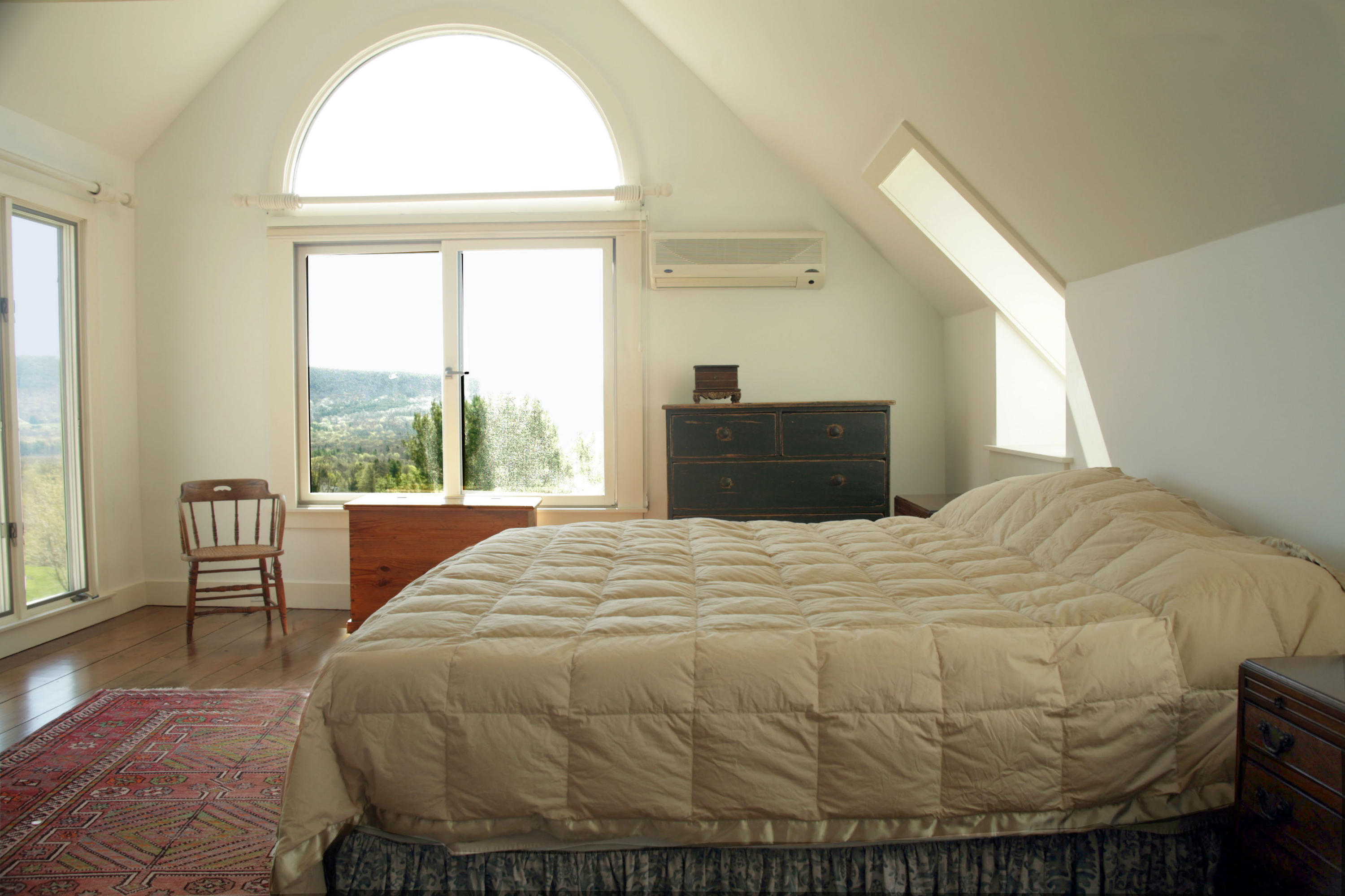 178 Perry Peak Road Richmond, MA 01254 - Photo 13 of 13 a bed sitting in a bedroom next to a window