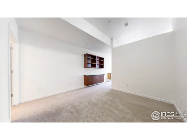 a black and white photo of a living room