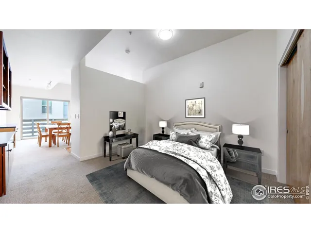 a view of a balcony with wooden floor and city view