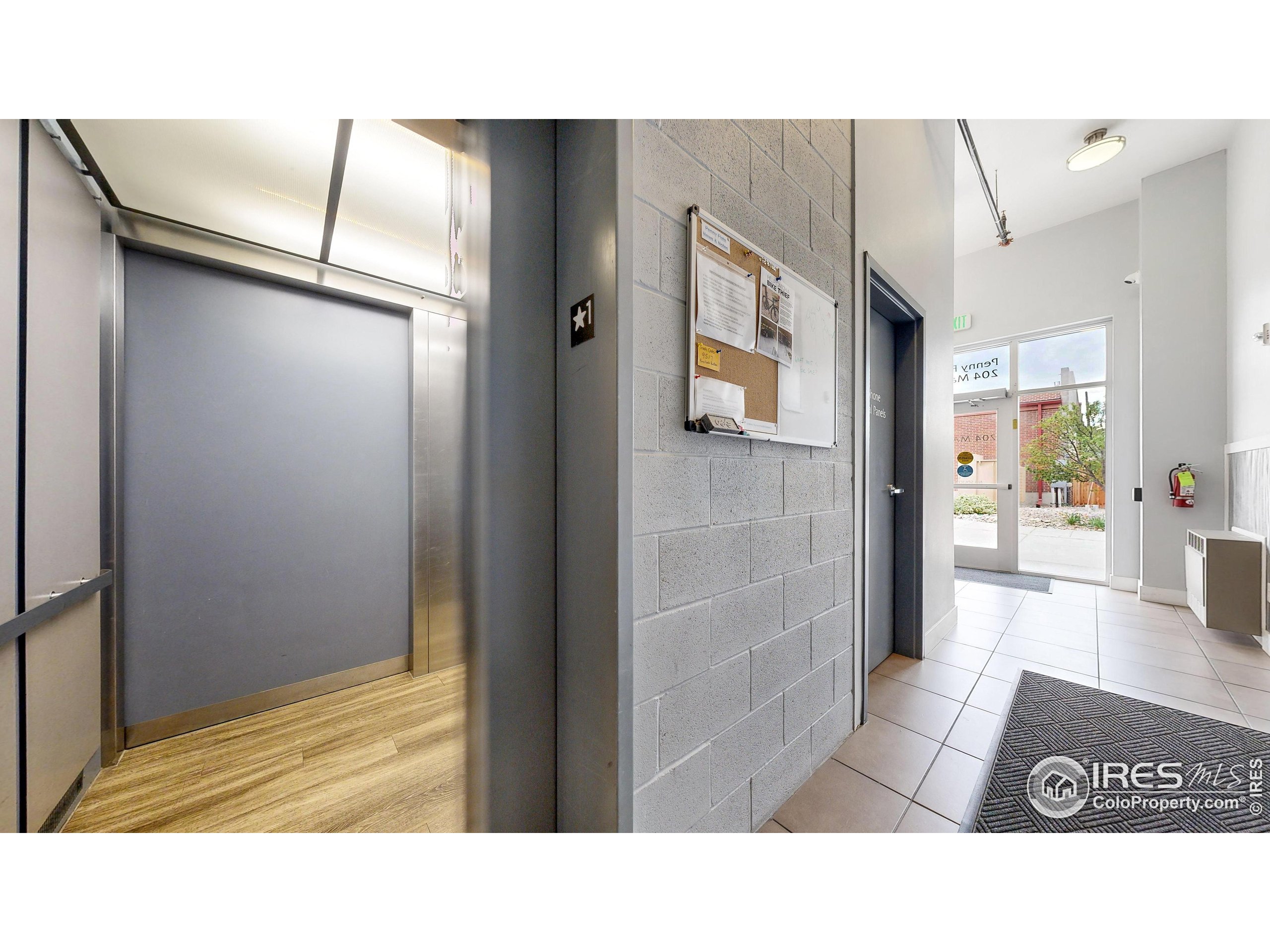 204 Maple Street, Unit 403 Fort Collins, CO 80521 - Photo 24 of 31 a bathroom with a sink and a mirror