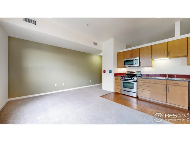 a bathroom with a toilet sink shower and mirror