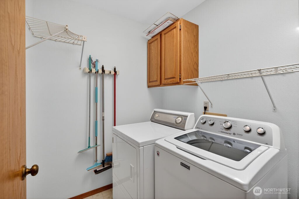 2105 Sutton Place Wenatchee, WA 98801 - Photo 13 of 39 a utility room with dryer and washer