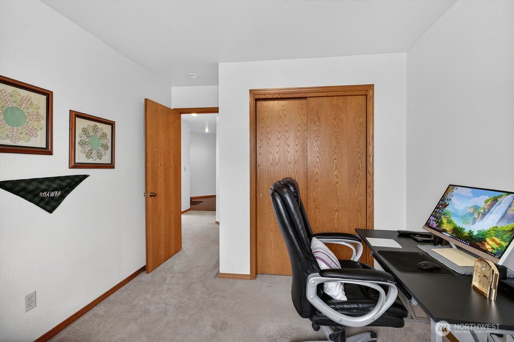2105 Sutton Place Wenatchee, WA 98801 - Photo 17 of 39 a view of a workspace with furniture and a window